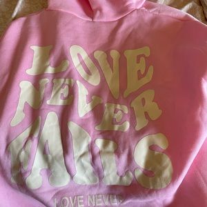 SHEIN sweatshirt Love never fails.